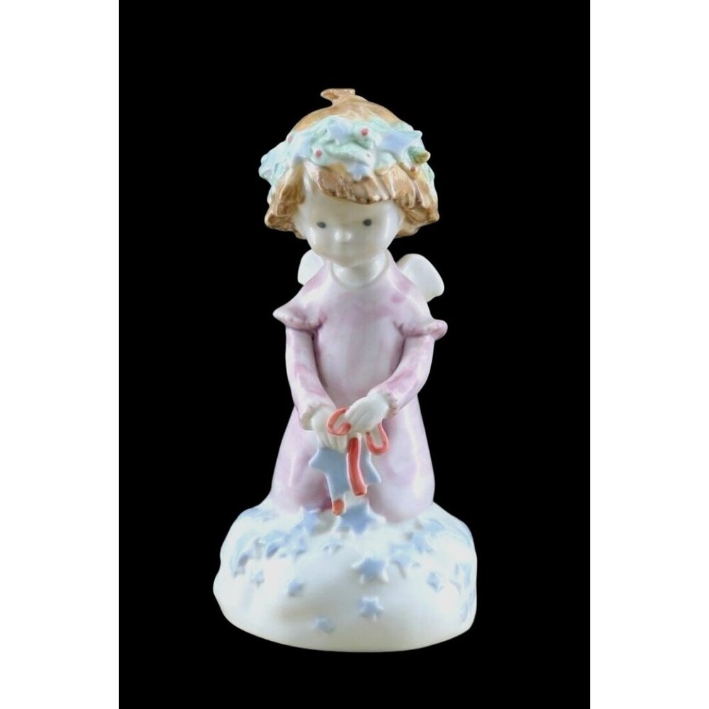 Vintage Porcelain Angel Figurine Holding Stars And Ribbons.  Maker Kinka Raecath